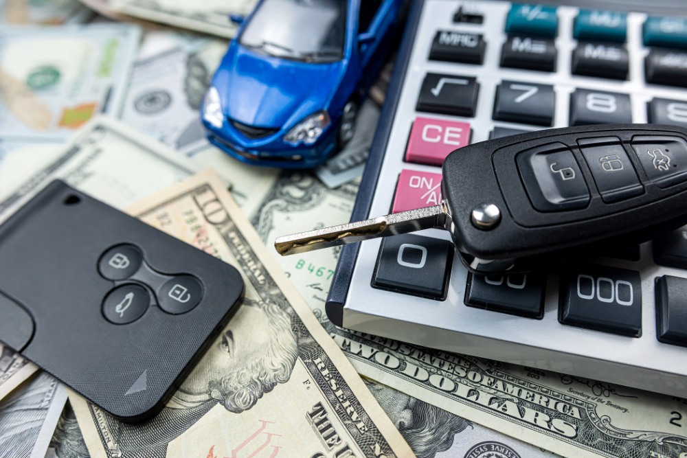Automotive Equipment Financing with Affirm & PayPal Automotive Equipment Financing image with keys, money and calculator from desk of automotive owner