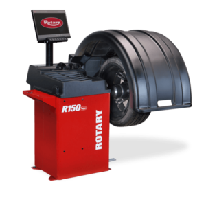 Rotary R150 tire balancer machine with hood down for passenger wheel balancing