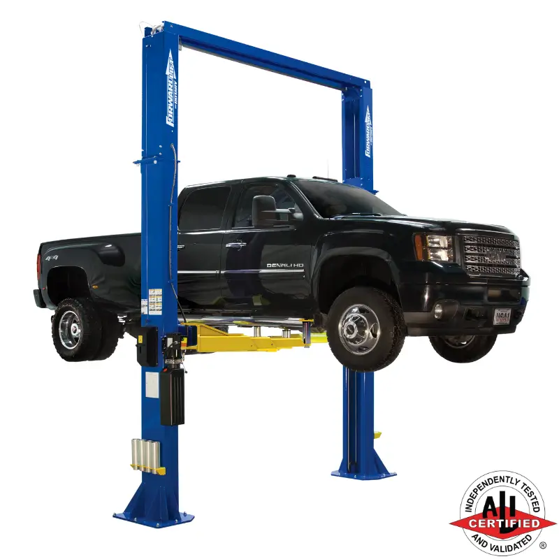 Forward Lift® DP18PRO | 3 Stage Symmetric Heavy Duty Two Post Lift Forward Lift DP18 two-post lift elevating a black GMC Denali HD truck, ALI certified