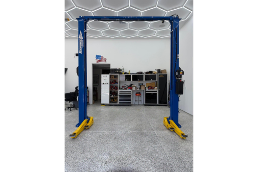 Forward Lift i10 two post lift installed in a customers garage